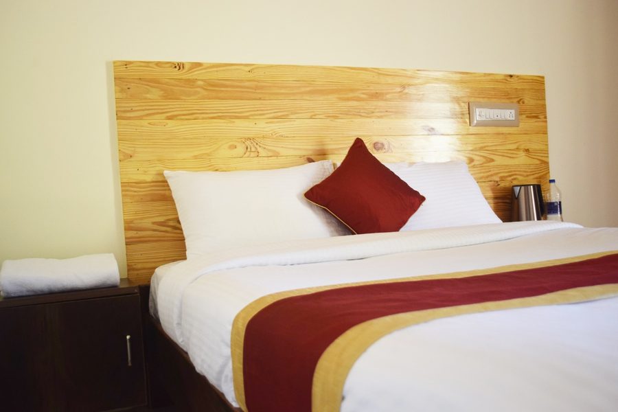 Deluxe Forest Room at Bandipur Hill View Homestay with wardrobe and flat screen TV